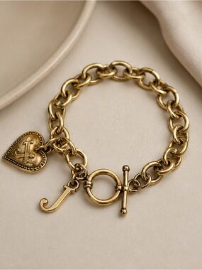 Vintage Juicy Couture gold-tone charm bracelet puffy heart charm bracelet